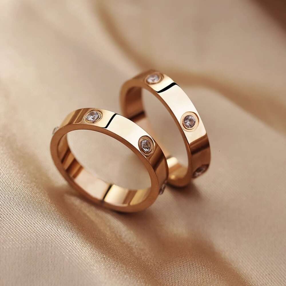 Hot Selling Korean Version of the Same One Nail Full Titanium Steel Ring, Niche Design, Light Luxury Water Diamond Plain Ring Couple