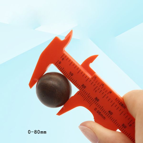 Mini regla de herramienta de medición de calibrador a vernier de plástico de 0-80 mm