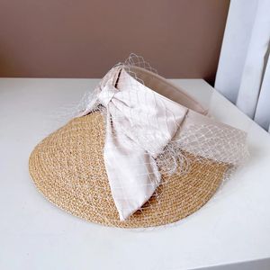 02yl2508364 Ins chic Japon Summer Raffia Grass Mesh Bowknot sans lady Sunshade Hat Woman Visors Cap 240514