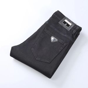 diseñador para hombre Jeans Elasticidad Jean Hombre pantalones Hombres y mujeres marca de moda pantalones de lujo pantalón de mezclilla Trend Brand Pantalones de motocicleta Mens Skinny LOGO botones 004