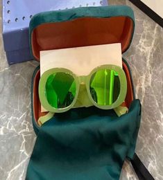 0517 Gafas de sol ovaladas delgadas para mujeres y hombres Gafas de perlas verdes fluorescentes de neón Gafas de sol ovaladas de moda Gafas Tonos Nuevo con Box3206728