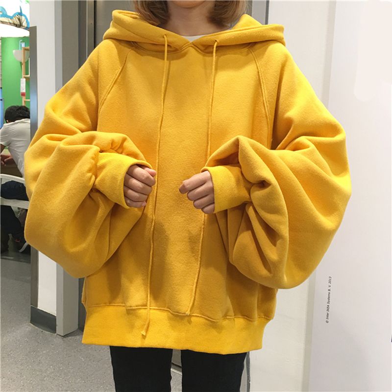 yellow hooded sweatshirt