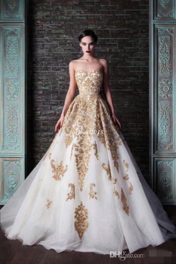 vestito da sposa bianco e oro
