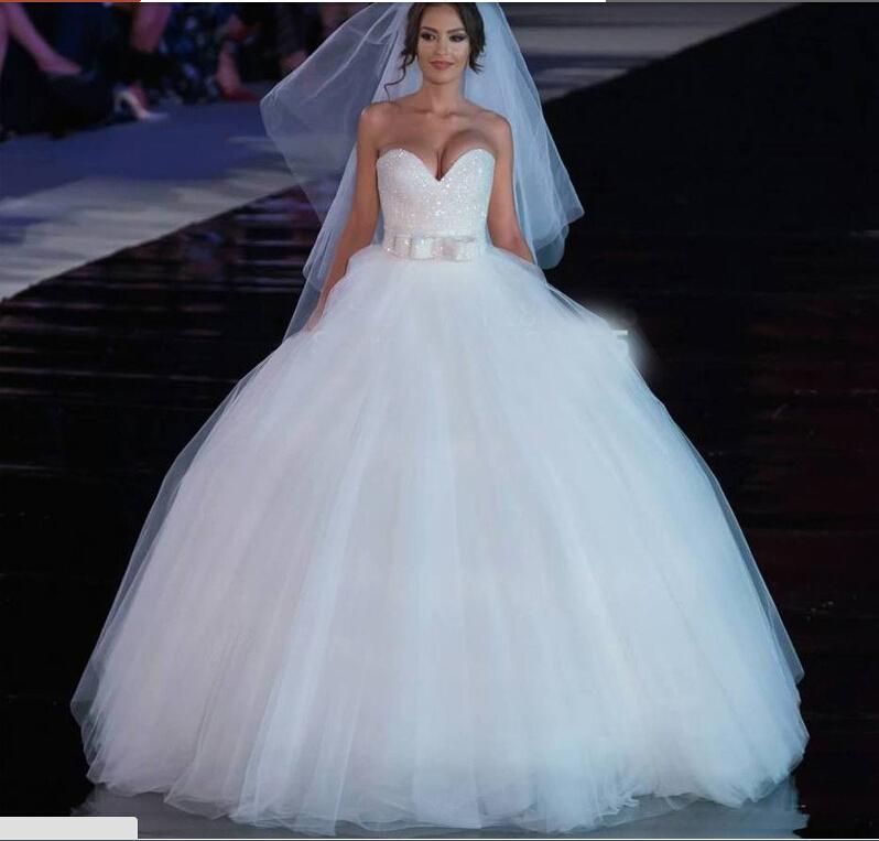 wedding dress with lace bodice and tulle skirt