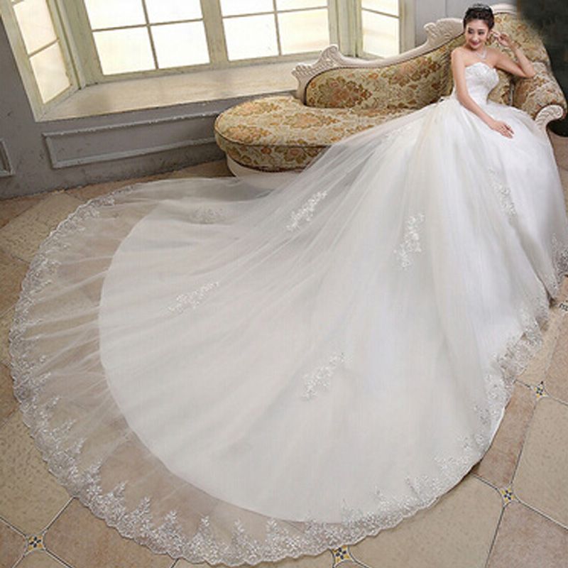 a line wedding dress with cathedral train