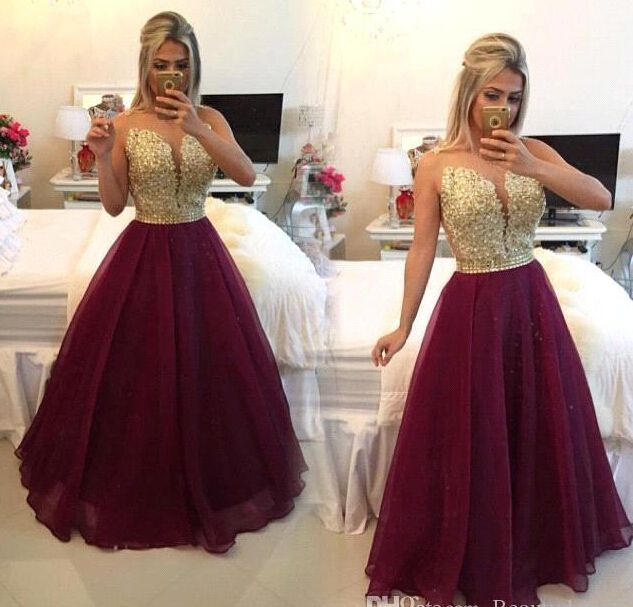golden and maroon gown