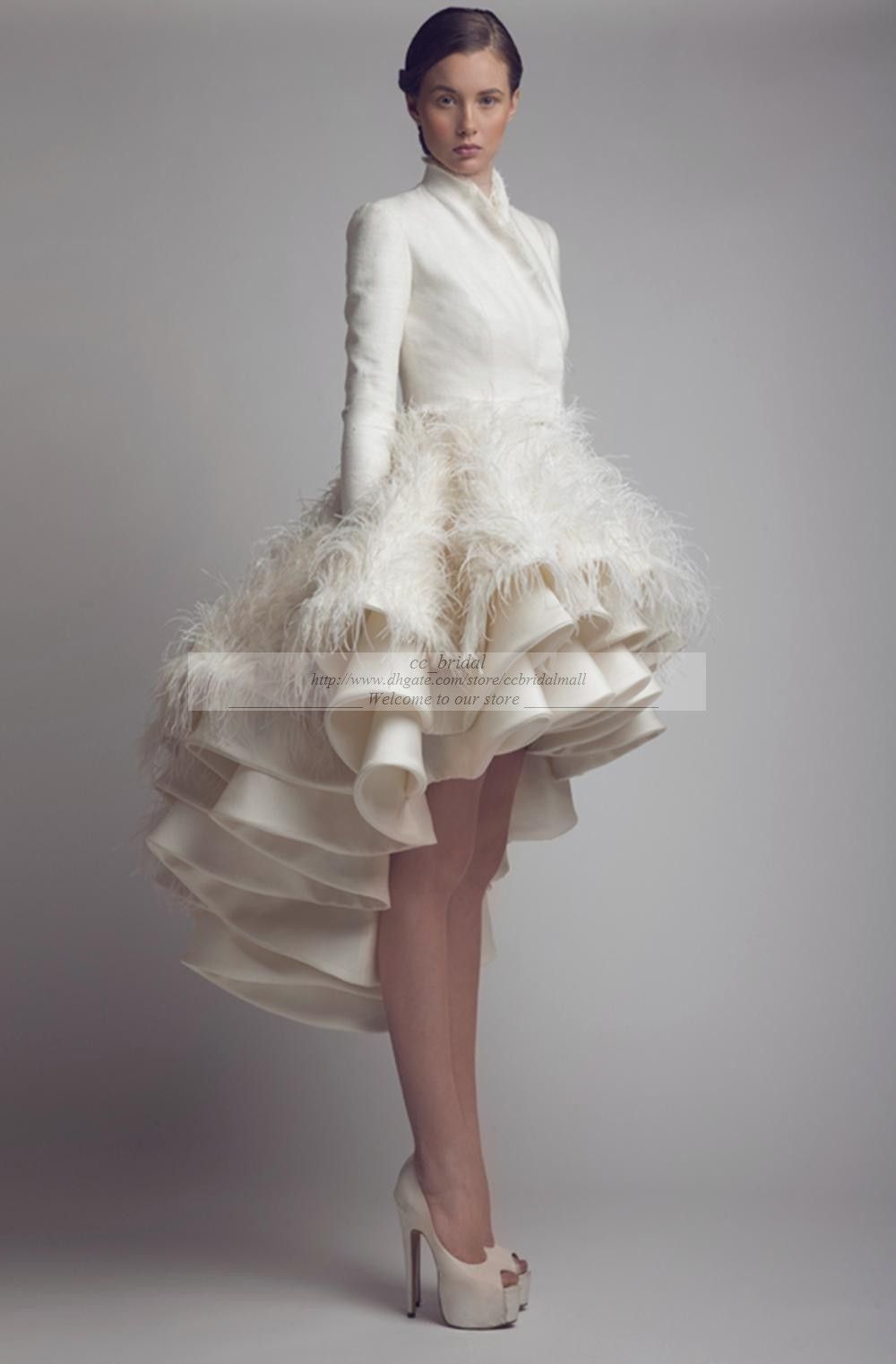 long dress with feathers at bottom