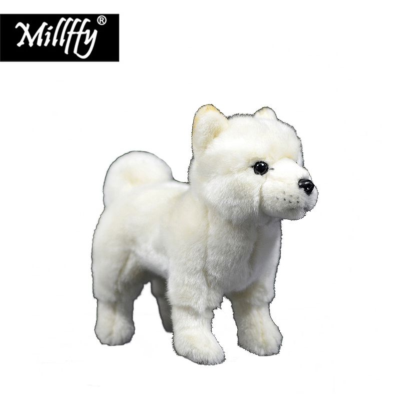 white stuffed animal dog