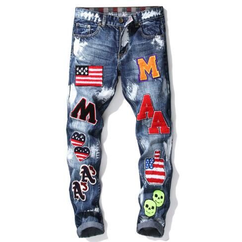 designer jeans with paint
