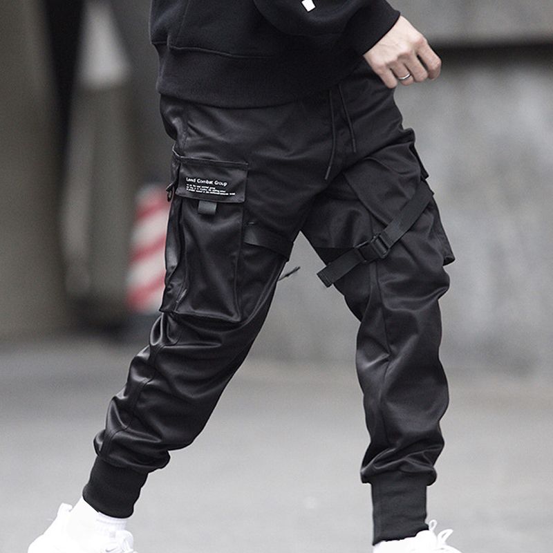 Compra Hip Hop Negro Frío De Carga Pantalones De Los Hombres De Cuerpo  Entero Elástico De La Cintura Del Basculador De Pantalones Con Bolsillos De  Pantalón Casual Fz1271 Barato | Entrega Rápida