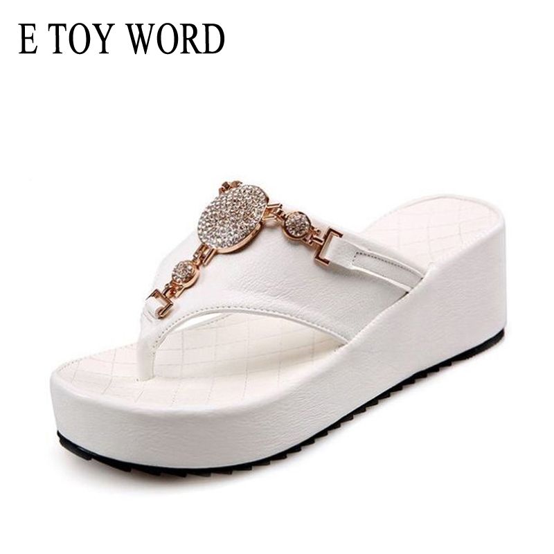 white flip flops with rhinestones