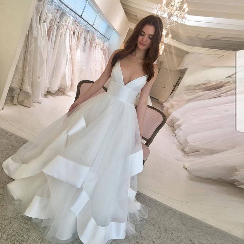 Compra Vestidos Espectaculares De La Boda Elegante De Correas Espaguetis  Blancos Con Gradas Hem Satinado Vestidos De Novia Para La Playa Sin  Respaldo Barato Vestidos De Boda Barato | Entrega Rápida Y