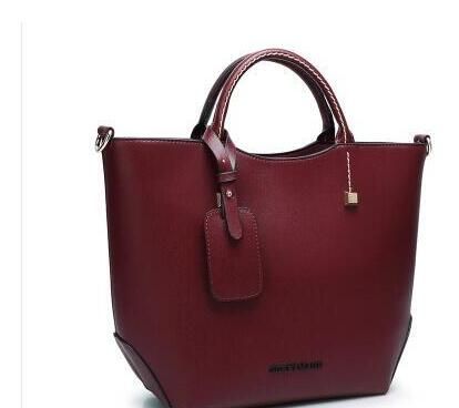 embossed leather handbags