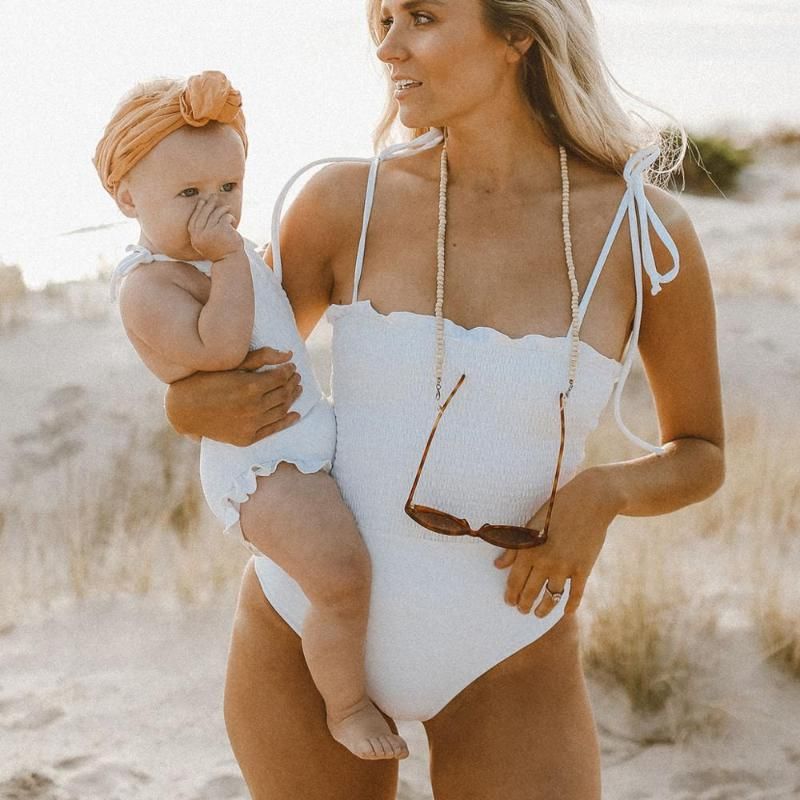 white ruched one piece swimsuit