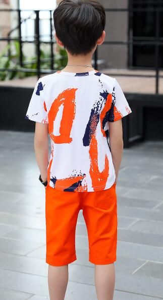 2019 Nuevo estilo de verano niños, pantalones cortos de manga corta, moda para niños, blanco, naranja, serie, sección de verano, traje ropa de algodón.