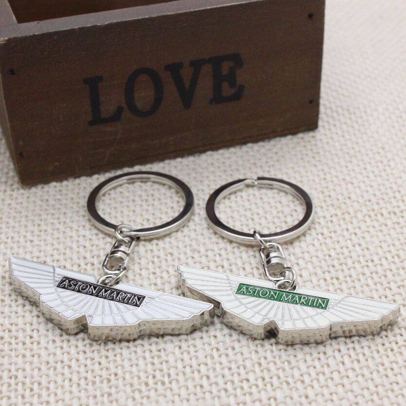 Compre Venta Al Por Mayor 10 Unids Lote Aston Martin Color Verde 3d Metal Car Logo Llavero Llavero Auto Colgante Accesorios Del Coche Llavero Para