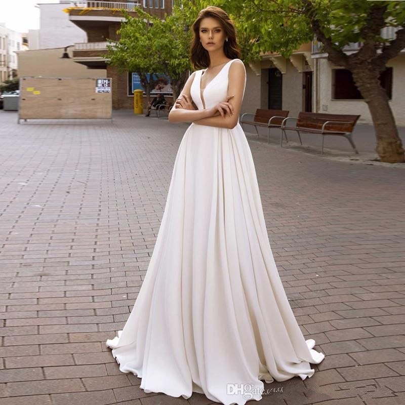 Vestidos de novia Wedding Dresses With Pockets A Line Deep V Neck Low Backless Long Train Bridal Dress Boho Wedding Gowns Vestidos de novia Wedding Dresses With Pockets A Line Deep V Neck Low Backless Long Train Bridal Dress Boho Wedding Gowns