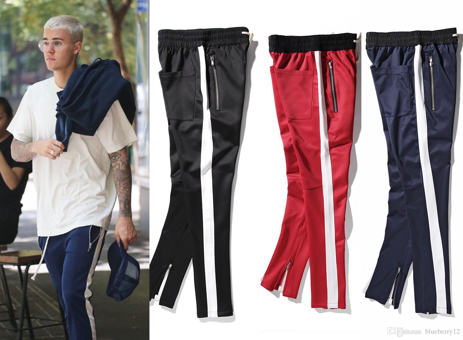 fear of god track pants black red