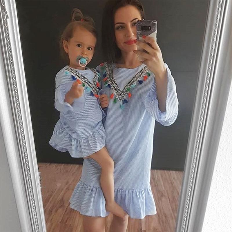 mom and newborn baby girl matching outfits