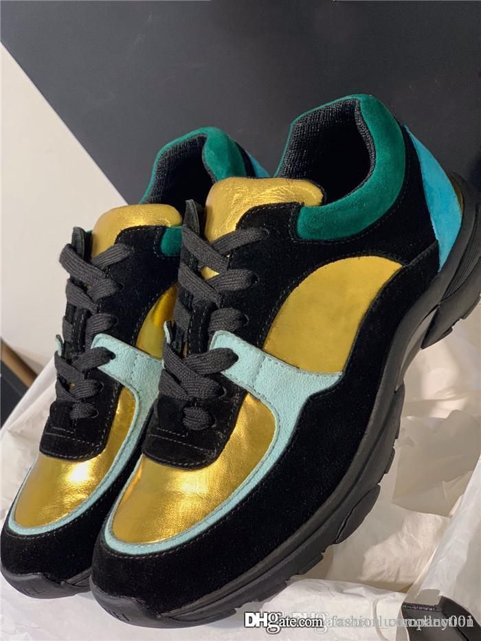 gold designer trainers