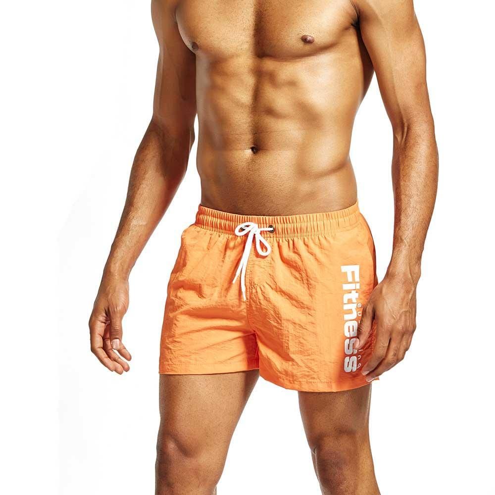 Compra Hombre Deporte Pantalones Cortos Pantalones De Playa Corriendo  Natación Gimnasio Fitness Ropa Pantalones Cortos Surfs Pantalones Cortos  Masculinos Culturismo Entrenamiento Entrenamiento Fitness Suelto Barato |  Entrega Rápida Y Calidad | Es.Dhgate