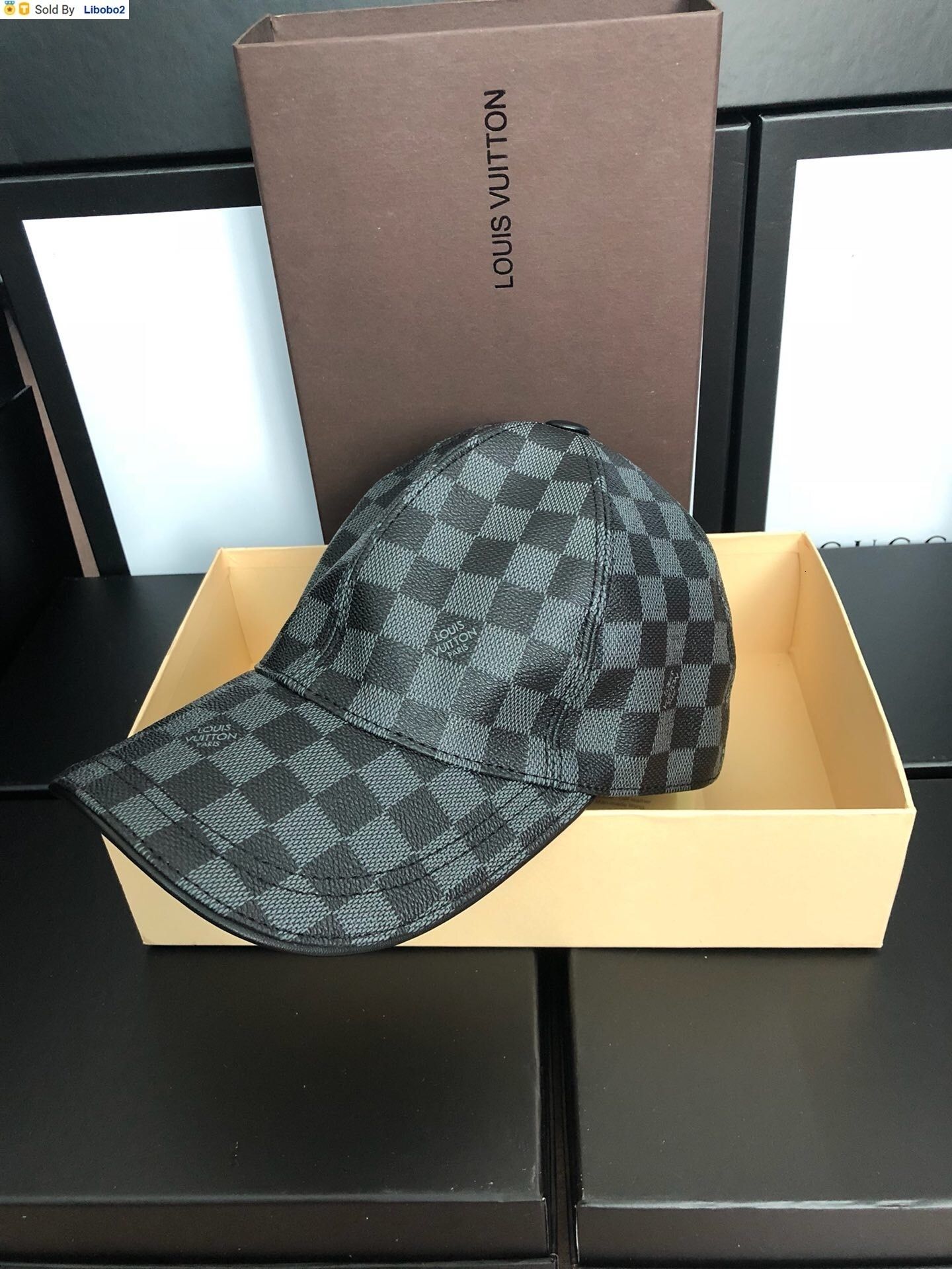 golf beret with ball on top