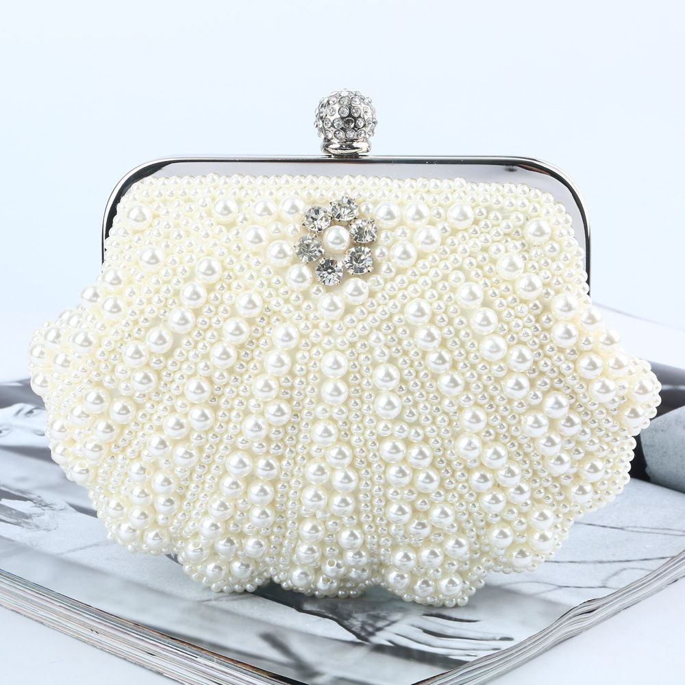 white woven handbag