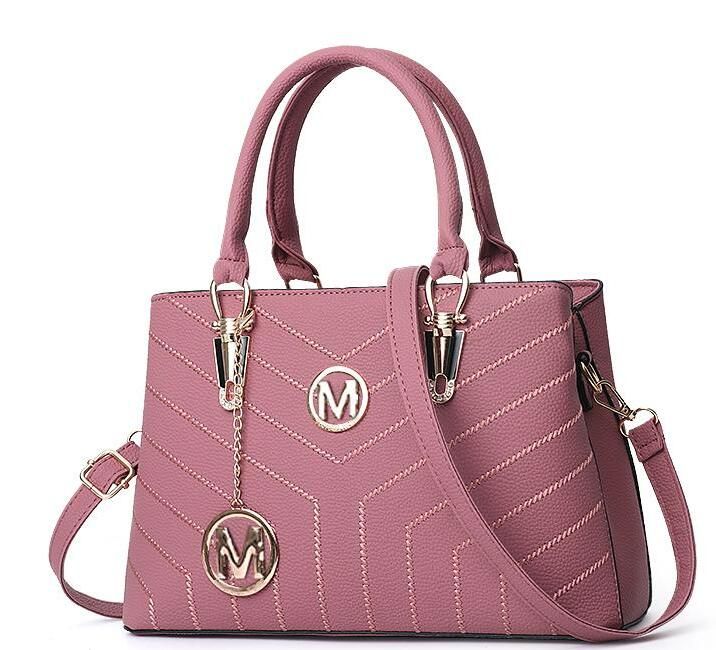 carteras mk rosadas