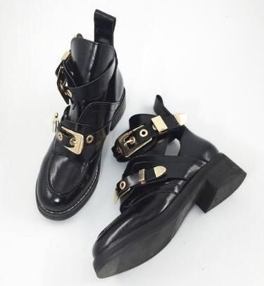 ankle boots with gold buckles