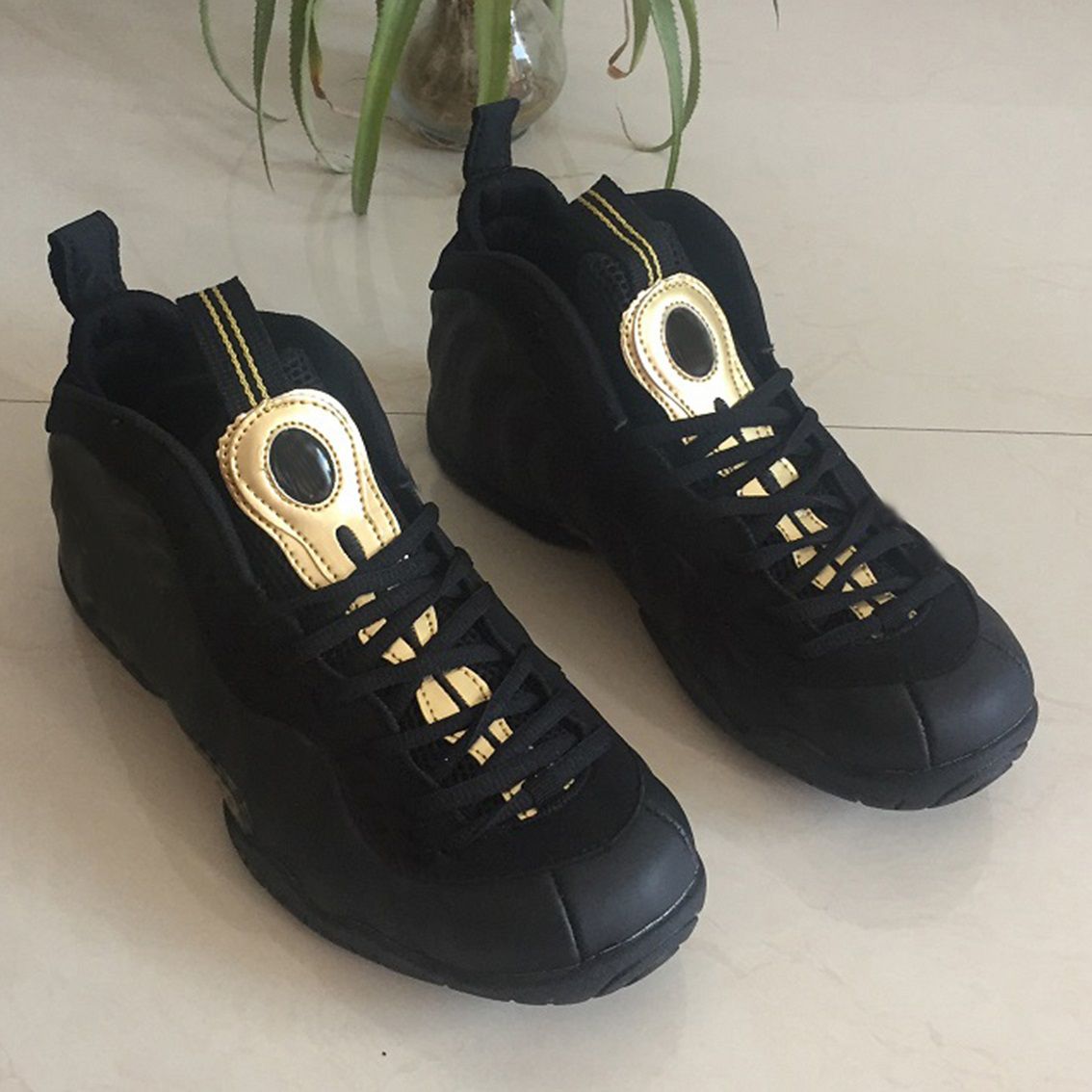 black and gold penny hardaway shoes