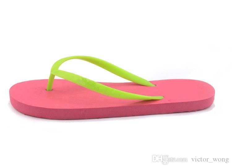pink and black flip flops