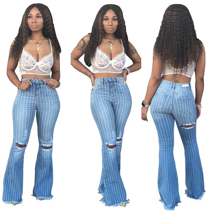 calça jeans cintura alta e boca de sino