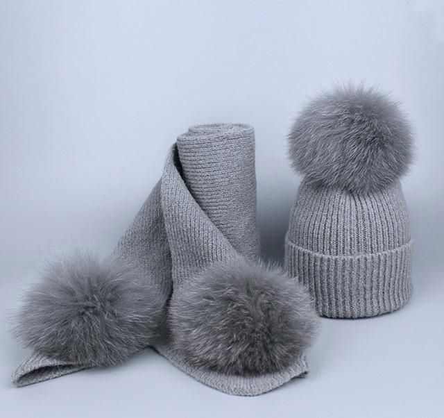 grey pom pom hat and scarf