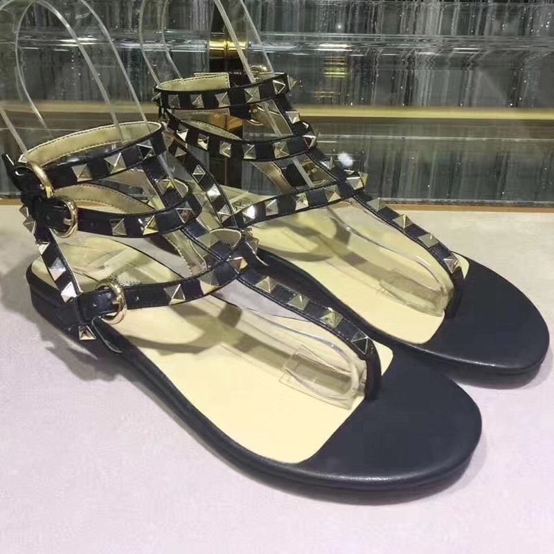 white strappy flat sandals