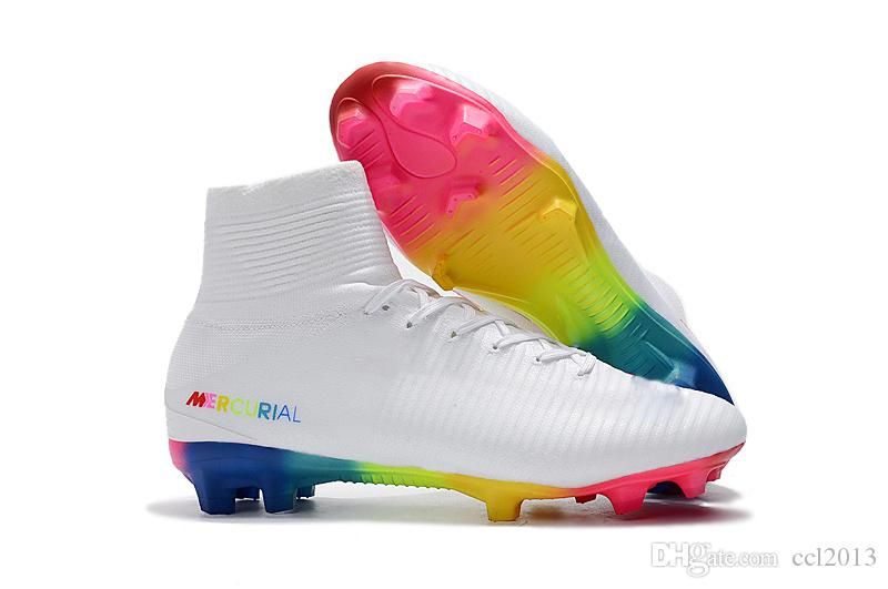 white and rainbow football boots