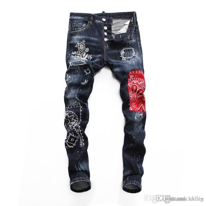 designer jeans with crosses on them