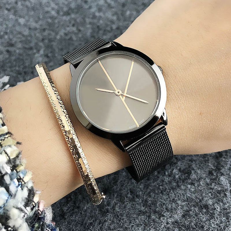 Woman all black rose gold