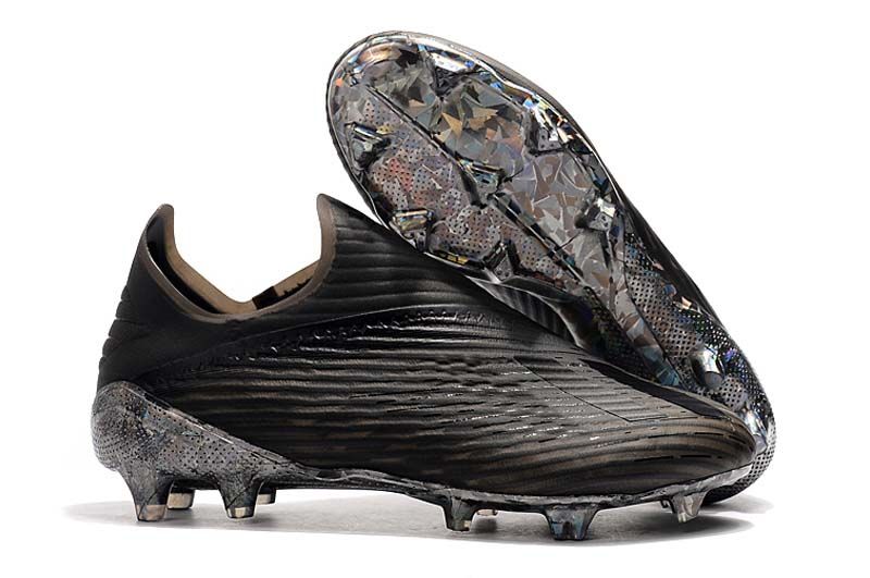 solid black football cleats