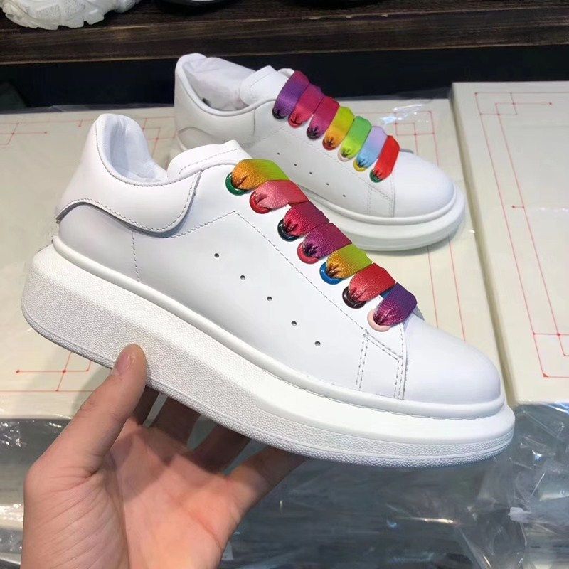 white shoes with rainbow laces