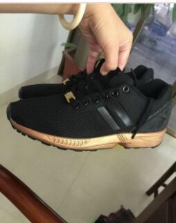 zx flux black gold