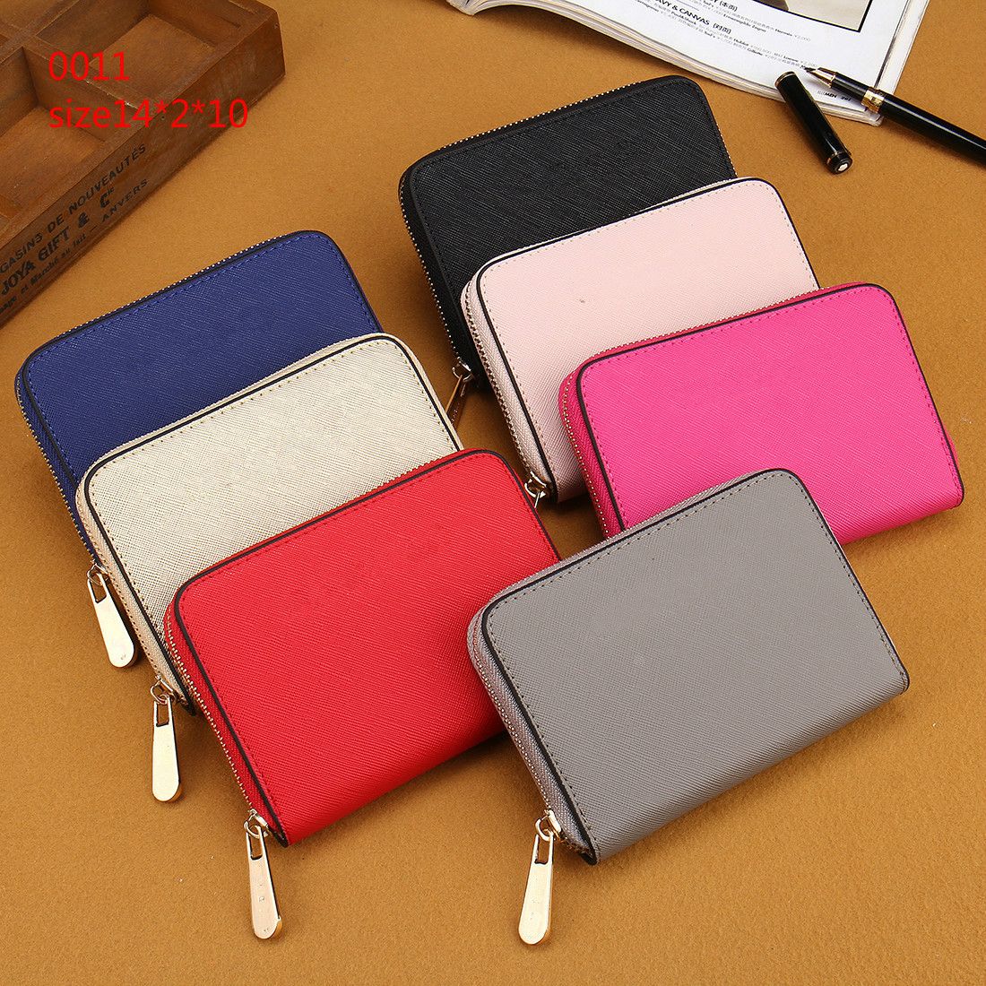 Compra Hot es Lady Billeteras Pequeñas Moda Mujer Billetera Casual Famosa  Cremallera Única Billeteras Para Mujer Monedero De Cuero Pu Hj0022 Barato |  Entrega Rápida Y Calidad | Es.Dhgate