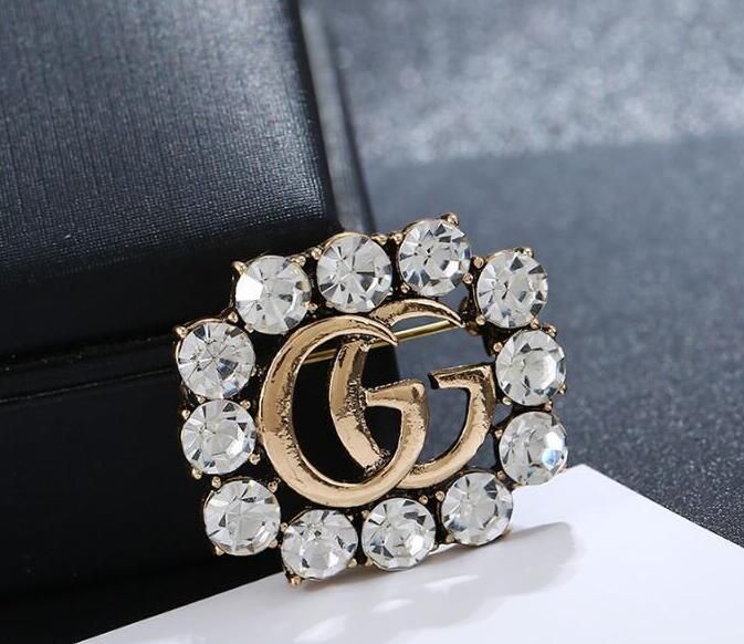 designer pins & brooches