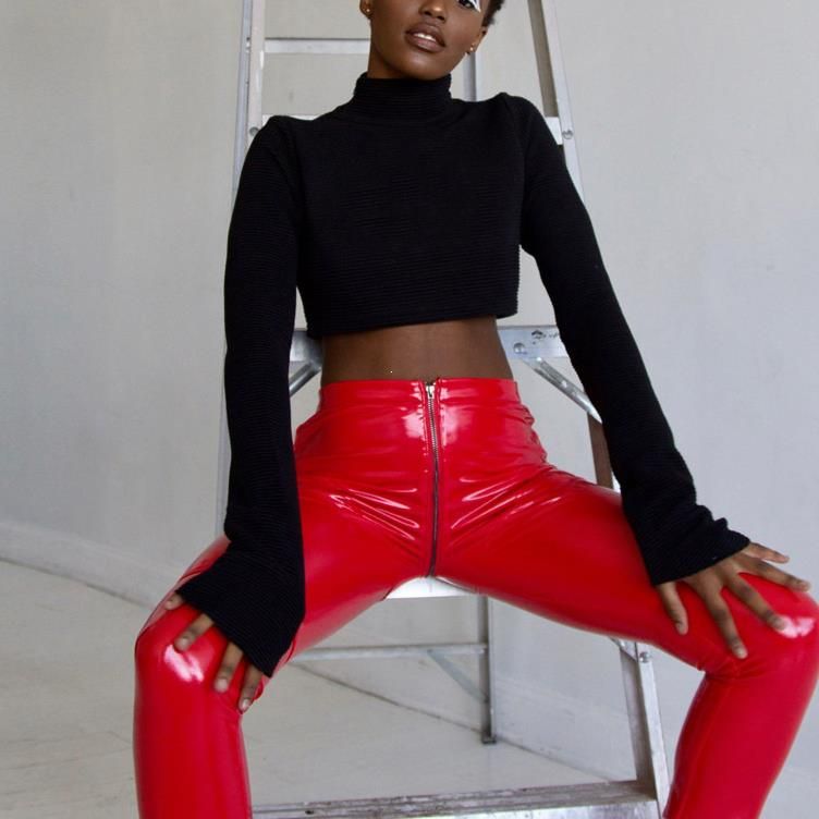 red shiny leather pants