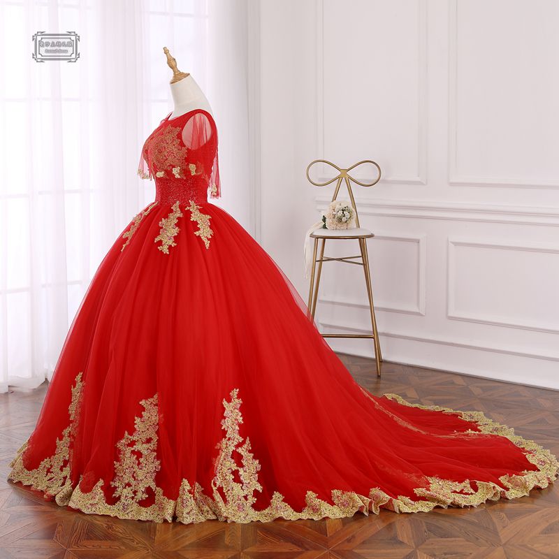golden and red gown