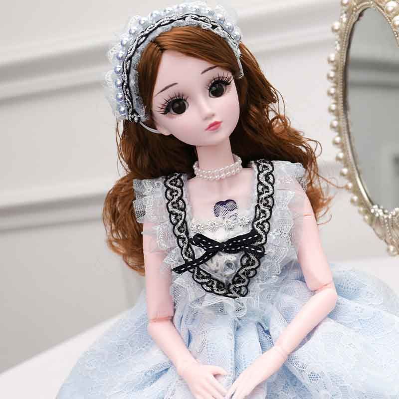 muñeca 60 cm
