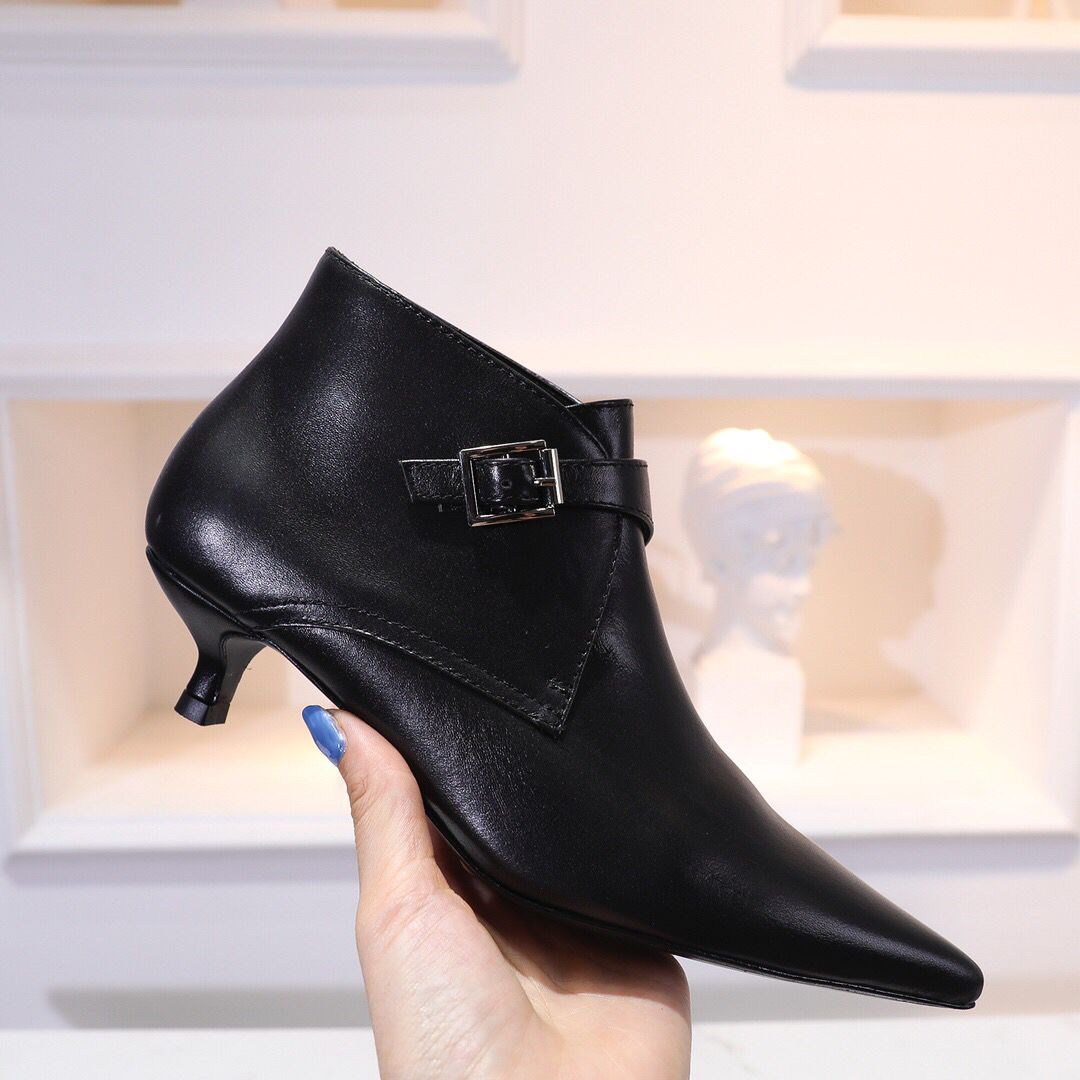 black patent low heel boots