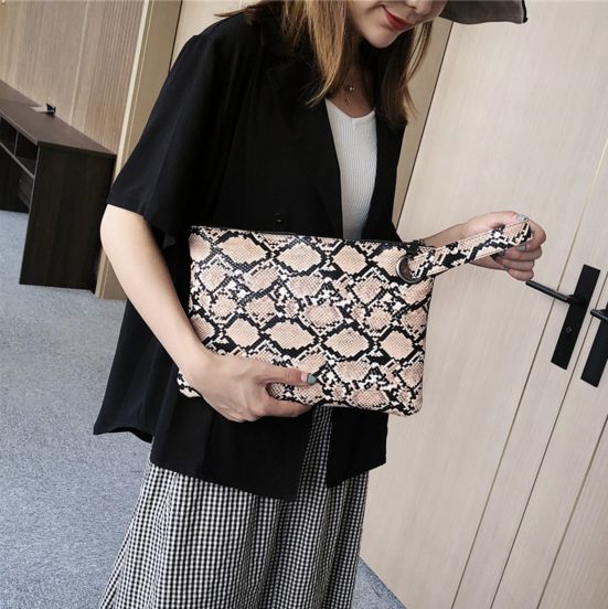 snake print clutch