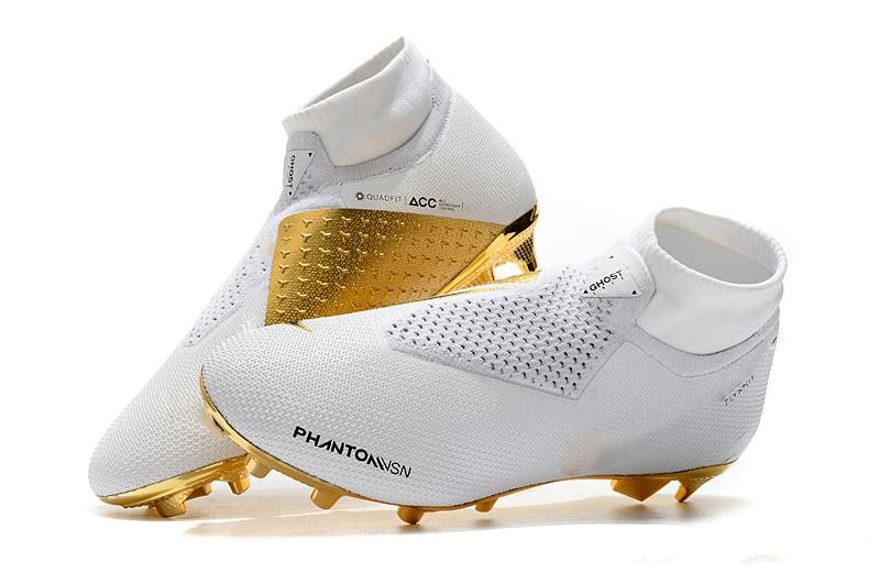 white and gold cleats