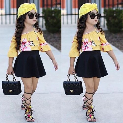 black skirt and yellow top