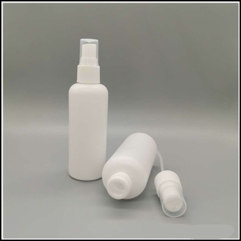white plastic spray bottles